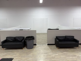 Commercial interior after slat wall installation and painting