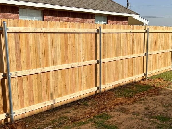Completed wood privacy fence